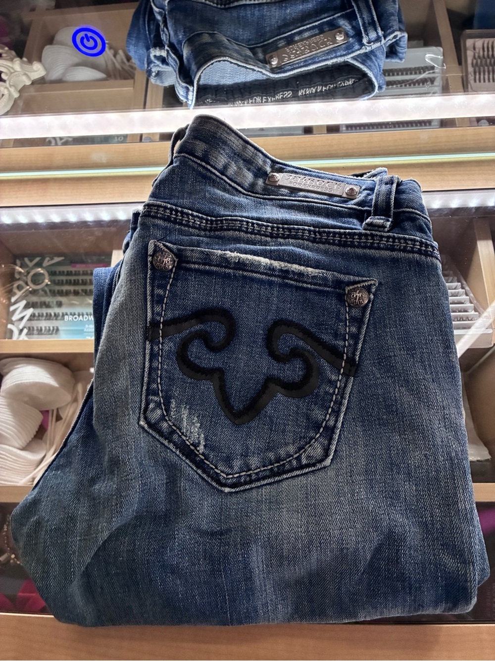 Vintage Rock Revival and Express crossover boot cut jeans.
